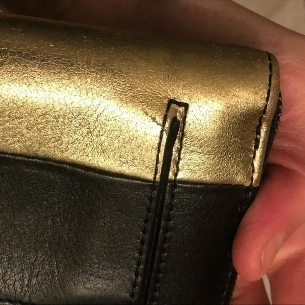 Fossil black and gold leather wristlet clutch wallet